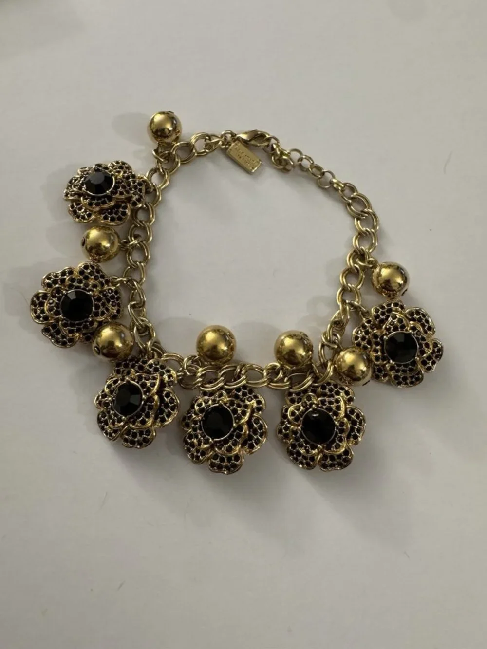 Kate Spade New York Gold Tone Chaim Bracelet Black And Gold Beads Flowers BB3 - Picture 1 of 4
